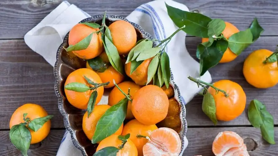 نارنگی‌ را نخورید! | ۳ ترفند خانگی برای داشتن موهایی سالم و خوشرنگ با نارنگی های خوشمزه